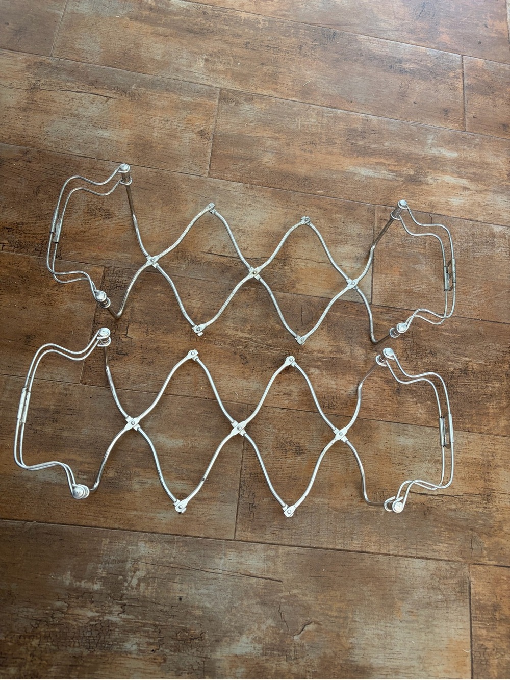 Pair of MCM Chrome Trivet set ware expandable to hold trays, plates, etc. Italy